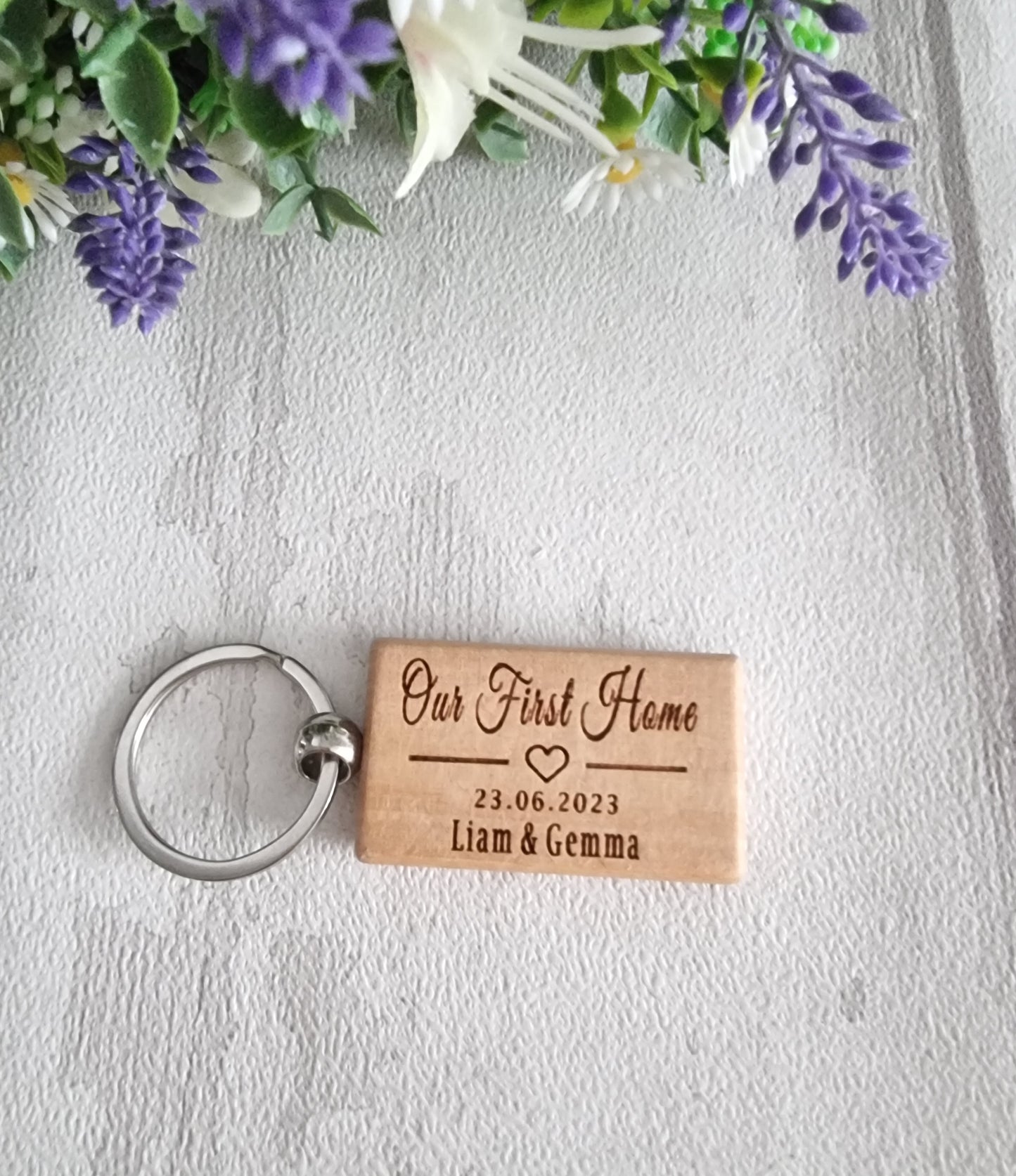 x2 Our first home Personalised keyring.