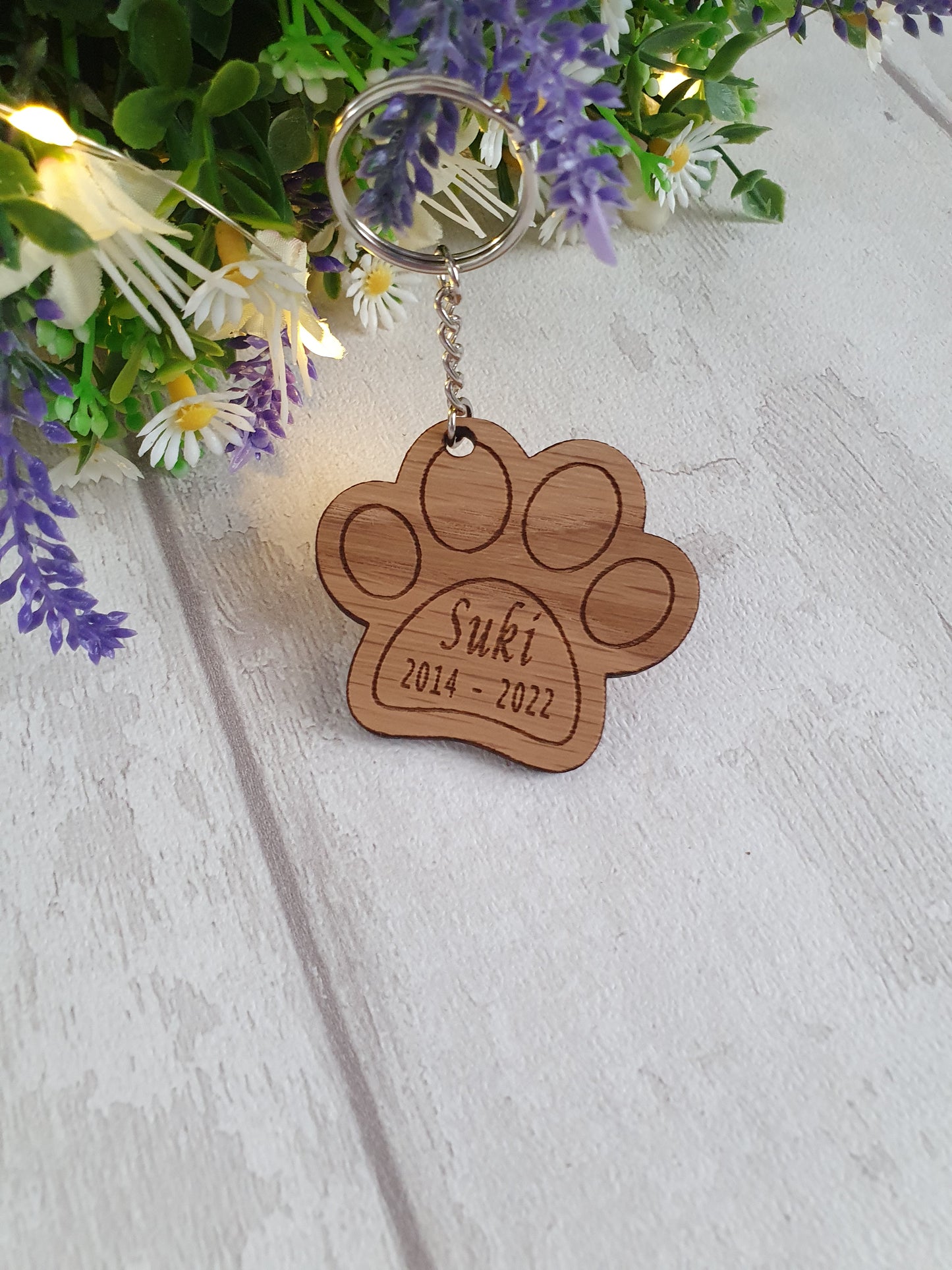 Personalised cat paw print keyring.