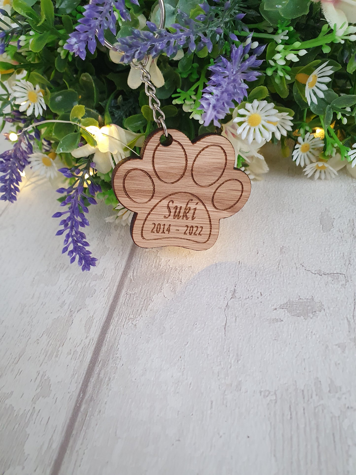 Personalised cat paw print keyring.