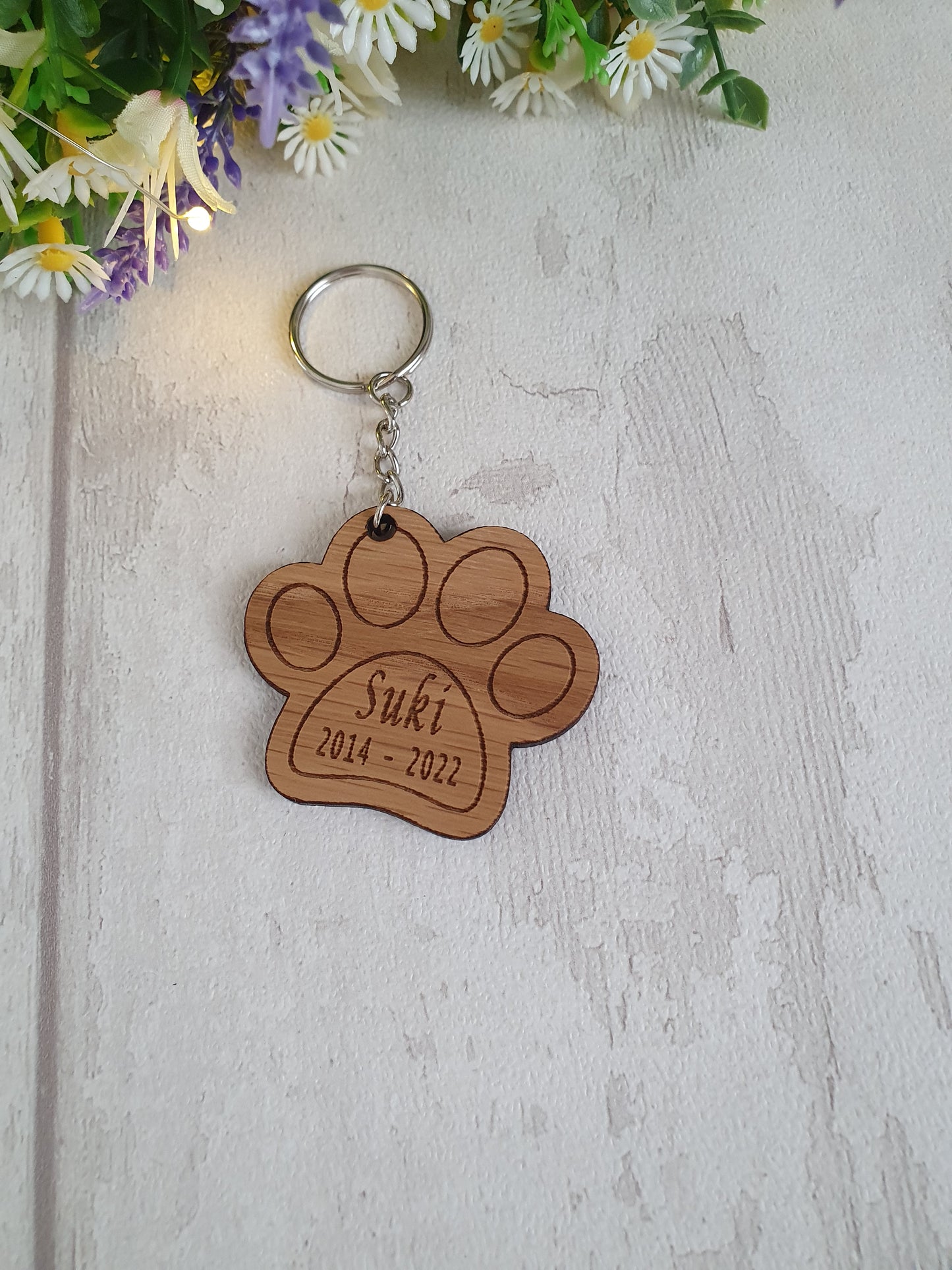 Personalised cat paw print keyring.